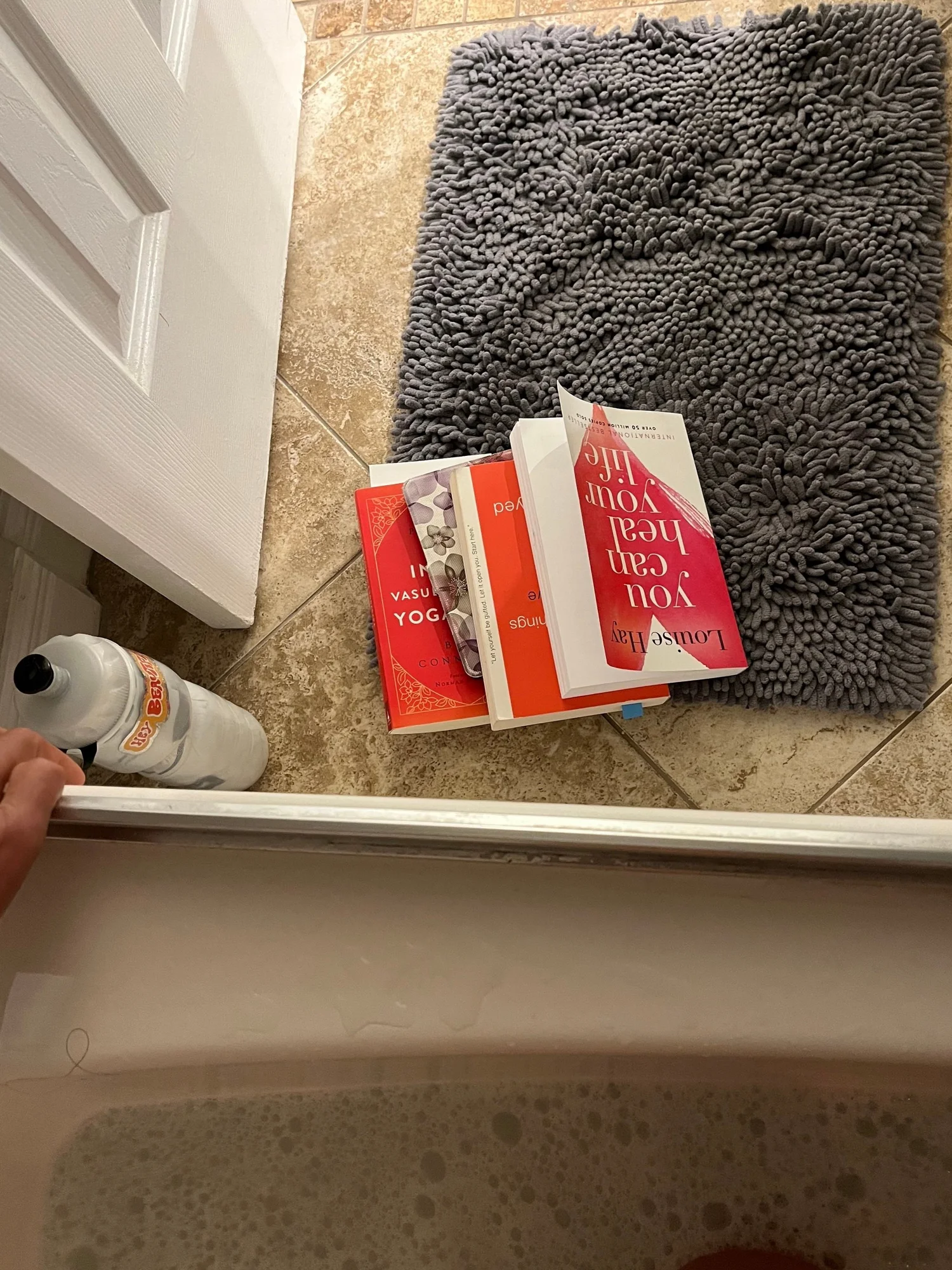 I brought all these books to the bathtub last week. I read a few pages of one.